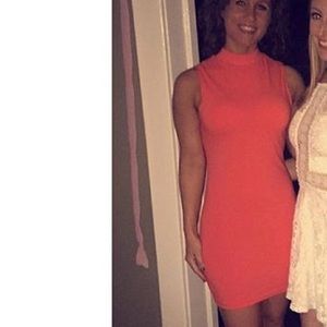 Orange body fitting dress